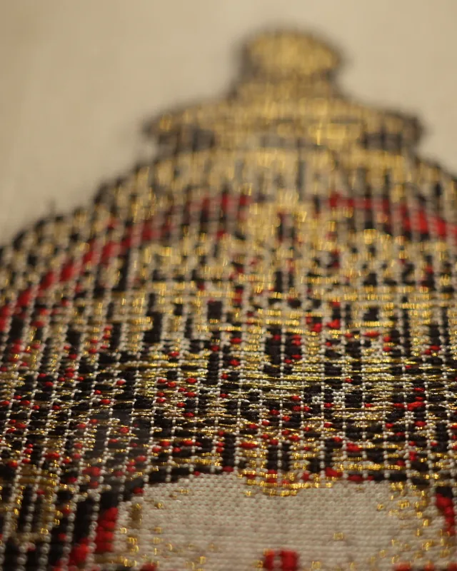Goddess Mahalakshmi's crown woven in gold zari on Kanjivaram silk